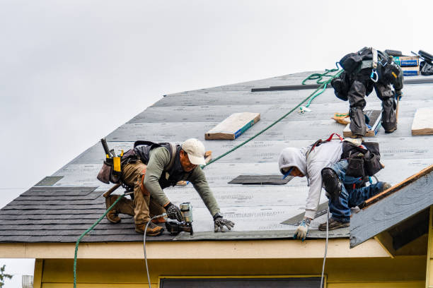 Professional Gutter Installation technician working in Summit, MS